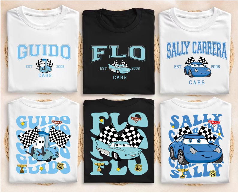 May include: Six t-shirts with car-themed designs. The shirts are white and black, featuring cartoon car graphics and text like "GUIDO", "FLO", and "SALLY CARRERA". Each design includes the word "CARS" and the year "2006".