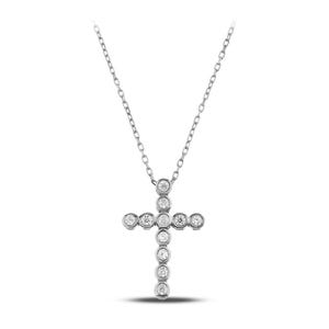 K&ouml;nnte beinhalten: Eine silberne Halskette mit einem Kreuzanh&auml;nger. Das Kreuz ist mit runden, klaren Edelsteinen verziert, die in einzelnen Fassungen gefasst sind. Die Kette ist zart und h&auml;ngt von der Oberseite des Kreuzes.
