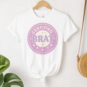Certified Brat Badge Tee | Pink Glitter Brat Shirt | Feminine Graphic Tee | Attitude T-Shirt