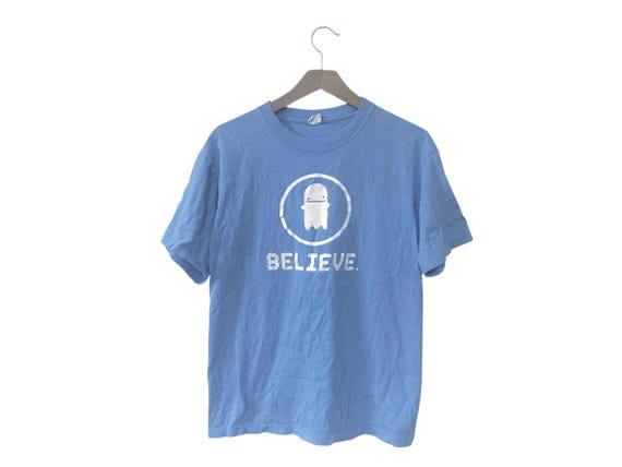Believe Paranormal Ghost Cartoon T-Shirt Light Blue Size Medium