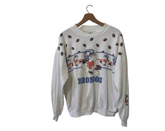 Vintage 1983 NFL Denver Broncos Horse Cartoon with Helmets Football Graphic Pullover Sweatshirt Long Sleeve White Size Large
