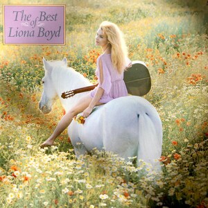 May include: Album cover for "The Best of Liona Boyd" featuring a woman in a pink dress riding a white horse through a field of wildflowers. A guitar is strapped to the horse's back. The album title is in a pink box.