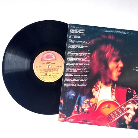 Triumph Rock 'N Roll Machine Vinyl LP Attic Records Rock Band 1977