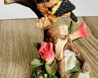 Danbury Mint May Oriole calendar bird figurine perched stump with pink flowers