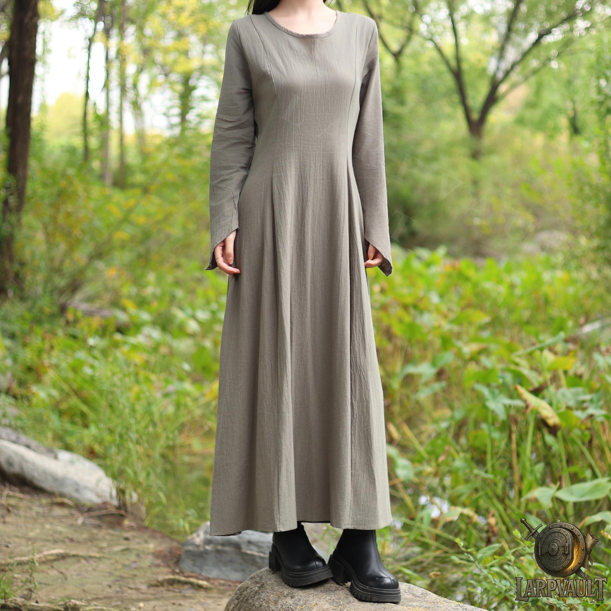 green emerald velvet dress Forest Green Smocked Tiered Long Sleeve Maxi Dress – PinkBlush main image 0