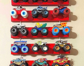 Hanging wall display for (3) 1:64 monster trucks. Customizable.