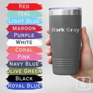 May include: A dark grey insulated travel mug with a silver lid, held by a hand. The text "Dark Gray" is printed on the mug. Colour swatches for various colours, including red, teal, and purple, are displayed to the left.