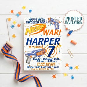 May include: A rectangular birthday invitation card featuring the text YOU'VE BEEN TARGETED FOR A NERF WAR! HARPER IS TURNING 7. The design includes illustrations of two toy blasters, a target, and orange and blue paint splatters with event details.