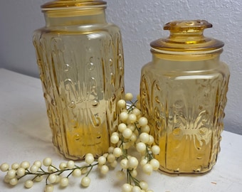 Vintage L.E. Smith Atterbury Scroll Amber Glass Canister Set Embossed Apothecary