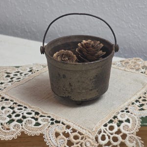 Antique Miniature Cast Iron Cauldron Footed Pot with Wire Bail Handle Rustic