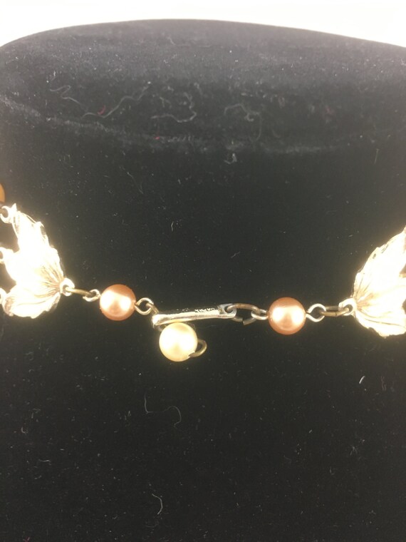 Vintage NOS pretty graduated triple strand ecru enamel dogwood necklace D9 
