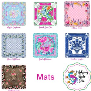 May include: Nine square mats with various designs. The mats feature floral, bird, and animal patterns in vibrant colors. Text on the mats includes "Mystic Daydream," "Peacock Lunu Chic," "Cottage Posies," "Bows & Blooms," "Birdie Blossoms," "Porcelain Garden," and "Highland Rose."