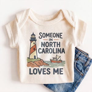 Someone In North Carolina Loves Me Baby Onesie® - Cute NC Lighthouse Bodysuit image 1