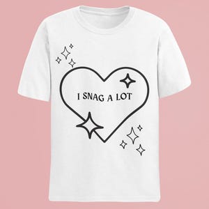 I Snag A Lot T-Shirt: Funny Indigenous Humor Tee with Heart Design