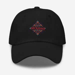 May include: Black baseball cap featuring a colorful geometric design with the text "Mi'kmaq" in red. The design includes orange, blue, and green elements. The cap has a curved brim and a structured fit.