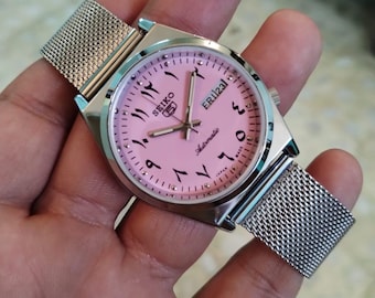 vintage Seiko 5 mens automatic soft pink arabic dial working wrist watch..37.5mm pre-owned daily wear retro