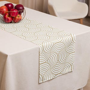 Table runner with gold pattern