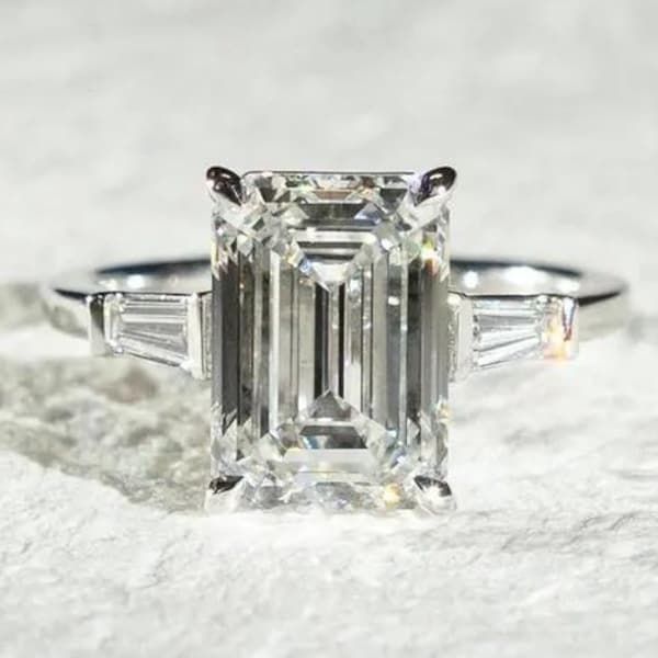 Emerald Cut Moissanite Three Stone Ring: Sterling Silver Baguette Accent