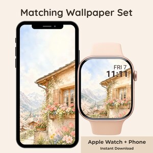 Pode incluir: Um smartphone preto e um smartwatch em ouro rosa com um papel de parede digital a condizer de uma casa rústica com floreiras e montanhas. O texto Matching Wallpaper Set e Apple Watch + Phone é visível no ecrã do dispositivo.
