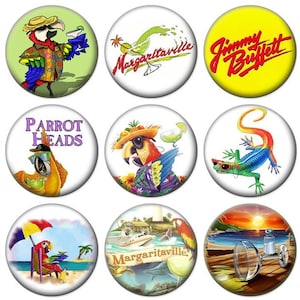 May include: A collection of 15 round buttons featuring various tropical designs, including parrots, palm trees, and the text "Margaritaville".