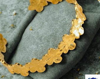 Brazalete con flor de oro