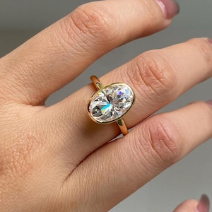 Anel de noivado oval de moissanita com engaste de 4 quilates, aliança de casamento de ouro 14k para mulheres, anel de aniversário oval com gelo triturado, oval alongado D-VVS1.
