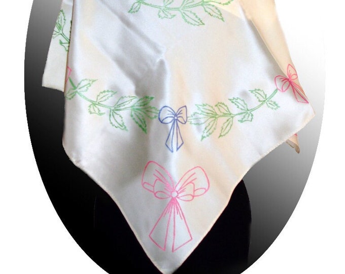 100% silk scarf with bows and leaves hand painted onto it