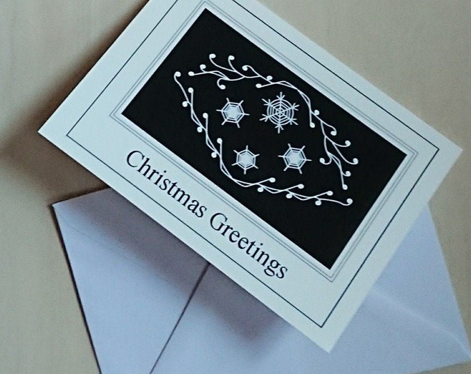 Christmas Greetings white snowflakes blank inside Christmas card