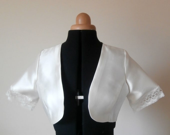 Ivory silk wedding bolero with short lace trimmed sleeves