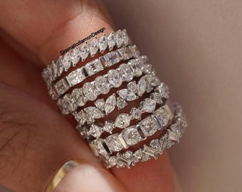 Anillo de media eternidad con diamantes de moissanita, forma cojín, ovalada y hexagonal, y diseño marquesa.