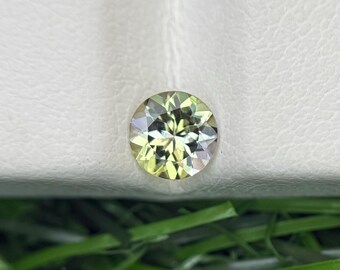 Heated Yellow Tanzanite Gemstone: 0.45 Carat Round Cut Loose Stone