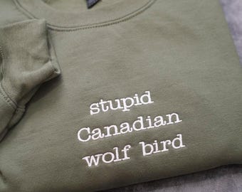 Embroidered Stupid Canadian Wolf Bird Sweatshirt, Hollanov, LGBT Hockey Fan Gift, Heated, Rival Game changer