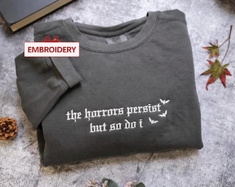 Embroidered The Horrors Persist But So Do I sweatshirt, hoodie, Trending Halloween Gift, Sarcastic Cozy Fall outfit, Comfort Colors