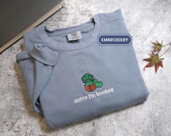 Embroidered bookworm comfort colors sweatshirt, sorry I'm booked cozy fall sweater for book lovers, readers gift