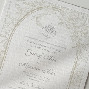 May include: A formal marriage certificate with elegant floral border and calligraphy. The names "Yusuf Alvi & Mariam Noor" are featured prominently. The document is printed on textured, off-white paper.