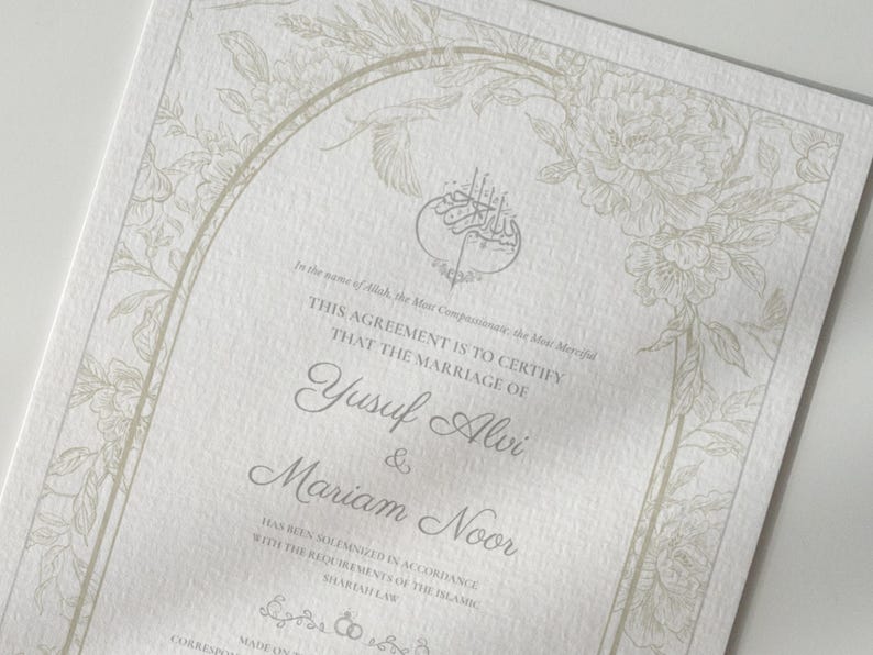 May include: A formal marriage certificate with elegant floral border and calligraphy. The names "Yusuf Alvi & Mariam Noor" are featured prominently. The document is printed on textured, off-white paper.