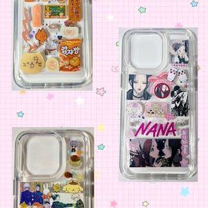May include: Clear phone cases decorated with various charms and images. One case features Japanese snacks and characters, another has "NANA" text and anime characters, and the third showcases anime characters.
