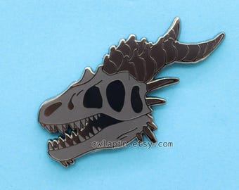Pin esmaltado de calavera de dragón