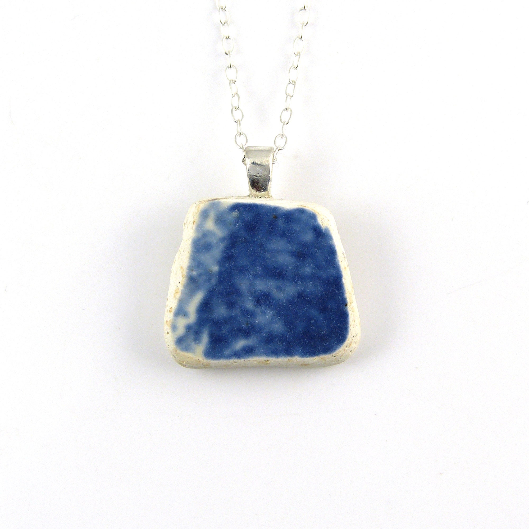 Triangular blue and white beach pottery pendant