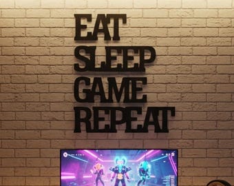 Modern 'Eat Sleep Game Repeat' Metal Wall Sign for Gaming Spaces