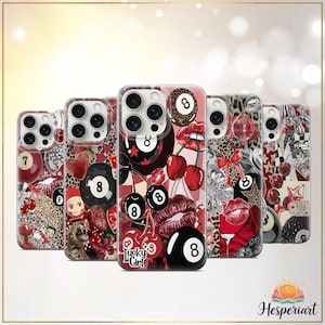 May include: A collection of phone cases with various designs. The cases feature images of cherries, lips, leopard print, and billiard balls. One case has the text "Lucky Girl". The cases are in a row, showcasing different styles.