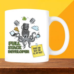 May include: White ceramic mug with a cartoon octopus design, server racks, and pizza. The mug has the text "FULL STACK DEVELOPER" and "FRONT END BACK END ALL MY FAULT".