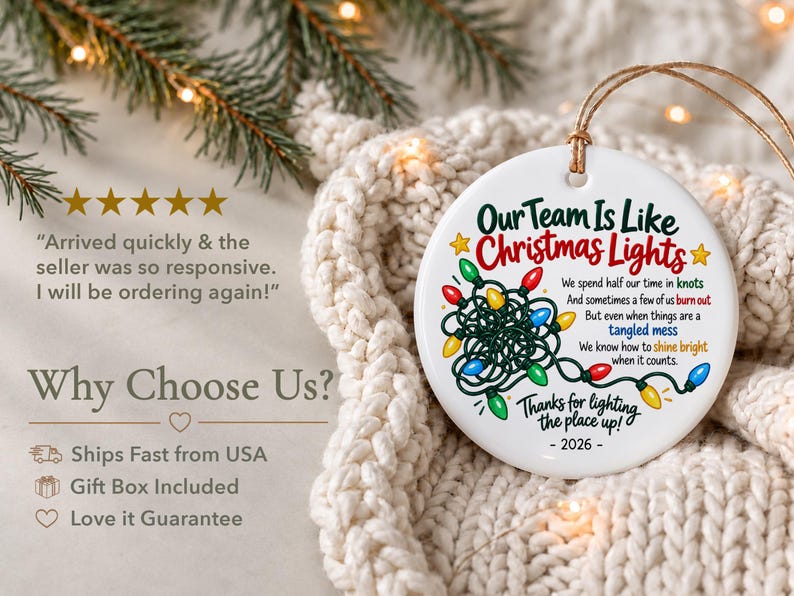 May include: A round white ceramic ornament featuring a graphic of tangled multi-coloured Christmas lights and the text: Our Team Is Like Christmas Lights, We spend half our time in knots, And sometimes a few of us burn out, But even when things are a tangled mess, We know how to shine bright when it counts, Thanks for lighting the place up, 2026.