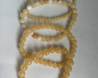 Bracelet extensible en perles de cristal d'aragonite (jaune) ~ infusion de reiki