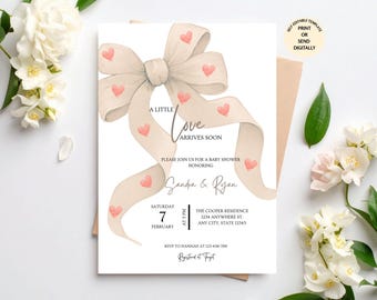 May include: Baby shower invitation with a watercolor bow and hearts. The text reads "A Little Love Arrives Soon" and includes details for Sandra & Ryan's baby shower. The invitation is a self-editable template.