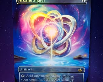 May include: A foil card titled "Arcane Signet" with a vibrant cosmic background. The card features a central design of intertwined golden rings with a bright light at the center. Text includes "Artifact" and game instructions.