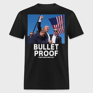 Camiseta clásica unisex con puño en alto a prueba de balas tras intento de asesinato de Donald Trump