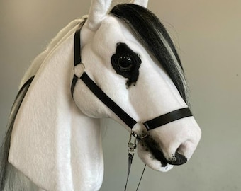 Cavallo a dondolo bianco: regalo equestre