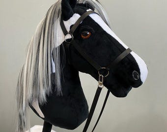 Zwart-wit hobbypaard: cadeau voor kinderen voor paardrijden