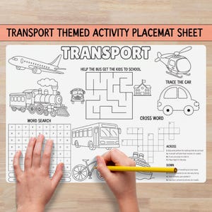 May include: A white transport-themed activity placemat with black line drawings of a plane, train, bus, helicopter, car, bicycle, and ship. Includes a maze, word search, and crossword puzzle. A yellow pencil is used to trace the car.